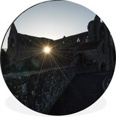 WallCircle - Wandcirkel - Muurcirkel - Zon door de gaten van Tintern Abbey in Wales - Aluminium - Dibond - ⌀ 120 cm - Binnen en Buiten XXL