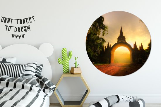 Lever de soleil à travers une arche de pierre. Cercle mural en aluminium ⌀ 140 cm