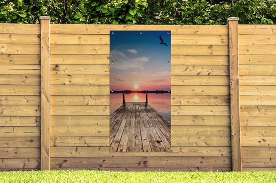 Tuinposter 80x160 cm - Tuindecoratie Steiger - Water - Zonsondergang - Roze - Horizon - Poster voor in de tuin - Buiten decoratie - Schutting tuinschilderij - Tuindoek muurdecoratie - Wanddecoratie balkondoek