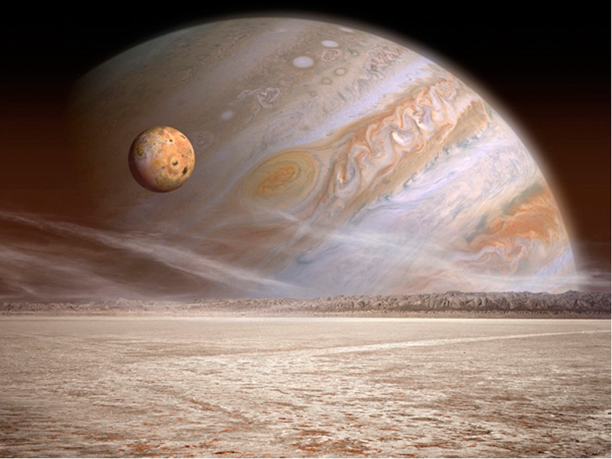 Fotobehang - Een kleine en een grote planeet.