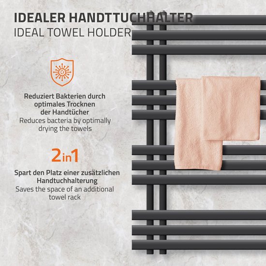 Een antracietkleurige handdoekhouder met twee peachkleurige handdoeken.