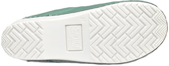 Onderkant van een lichtgroene Sanita klomp met witte zool en visgraatprofiel.