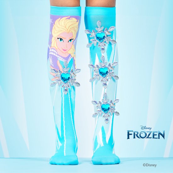 Blauwe kniekousen met Elsa-print en drie grote 3D-sneeuwvlokken met blauwe steentjes.