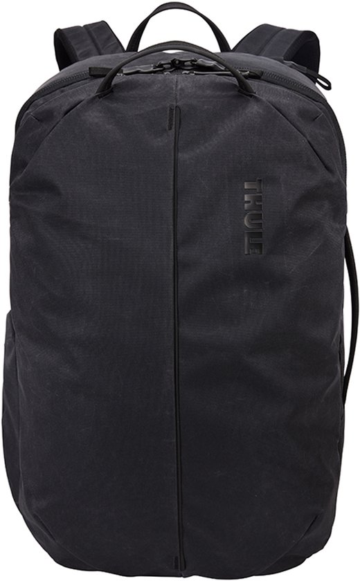 Sac à dos Thule noir avec une couture centrale verticale et un logo.
