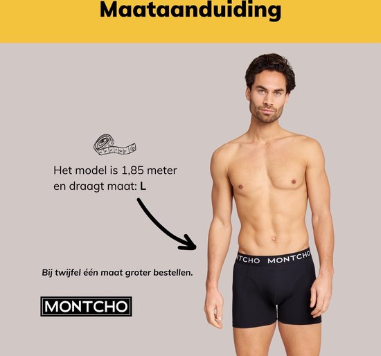 Model van 1,85m draagt maat L, zwarte Montcho boxershort met logo op de tailleband.