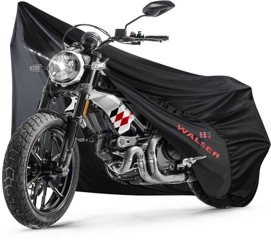 Motor met zwarte hoes, checkered detail op tank, verlichting aan.