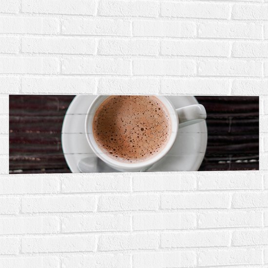 Muursticker - Bovenaanzicht van Kop Koffie - 90x30 cm Foto op Muursticker
