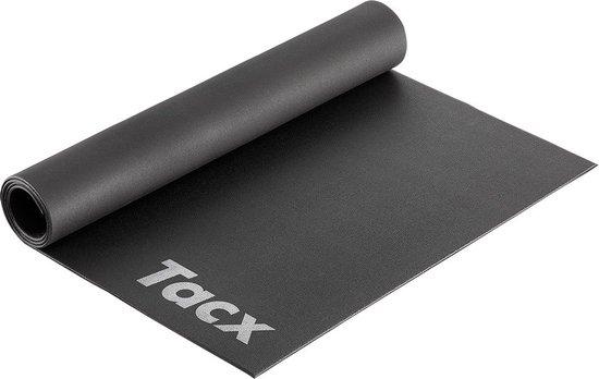 Zwarte Tacx fietstrainer mat, deels opgerold.