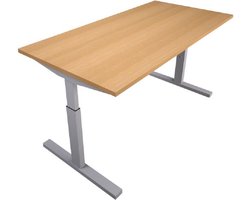 “PrimaVera” ergonomisch bureau met de afmeting van 180 x 80 cm. Frame aluminium, werkblad Lindberg-eiken. In hoogte te verstellen van 62 – 86 cm.