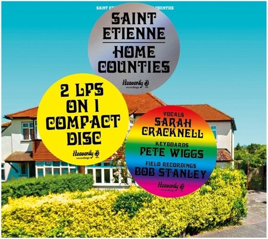 Sleeve met een huis en drie cirkels met tekst: Saint Etienne Home Counties, 2 LPs on 1 CD (geel), Vocals Sarah Cracknell, Keyboards Pete Wiggs, Field Recordings Bob Stanley (regenboog). Heavenly recordings.