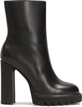 Minimalist black boots with high heel and platform