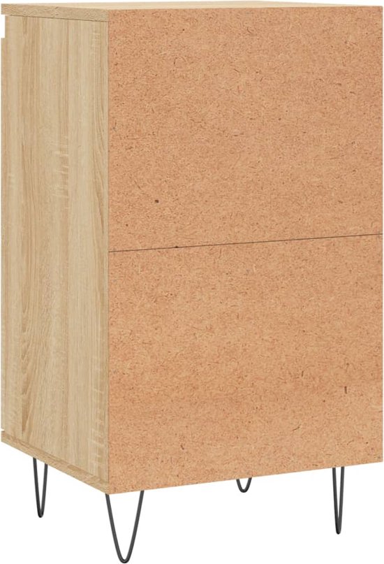 Achterkant van een dressoir met eikenprint en zichtbare spaanplaat, zwarte hairpin poten.