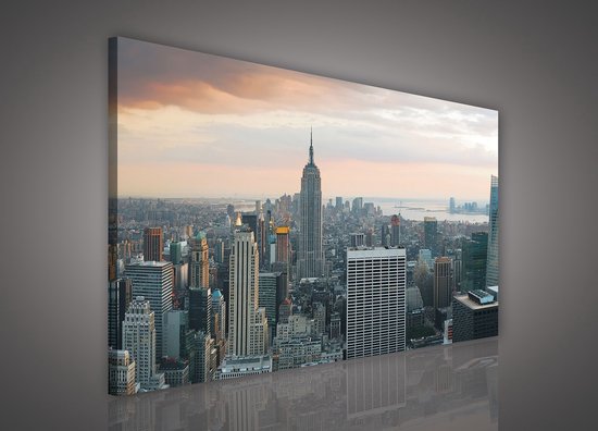 Canvas Schilderij - New York - Stad - Lichten - Skyline - Toren - Blauw - Gebouw - Schilderij Woonkamer - Schilderijen op canvas - Inclusief Frame - 100x75cm (LxB)