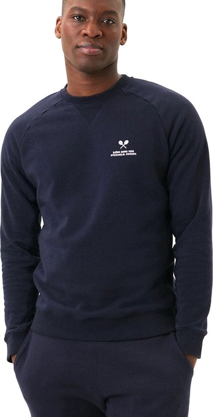 Donkerblauwe Björn Borg sweater met raglanmouwen en klein wit tennisracketlogo op de borst.