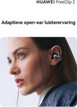 HUAWEI FreeClip 2: adaptieve open-ear luisterervaring met een vrouw die ze draagt.