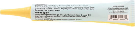 Gele tube met 'KELOID BUMP GEL' in blauwe letters en ingrediëntenlijst.