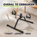 Zwarte VirtuFit MB100 stoelfiets, compact en opvouwbaar, ideaal voor gebruik bij een bureau of op kantoor.