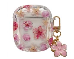 Transparant roze hoesje voor oordopjes dames met bloemen patroon en decoratieve hanger geschikt voor AirPods 4 met ronde vorm en goudkleurige clip