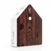 Huisvormige geluidsmachine met houten print, ZERI logo en luidspreker. Aan de zijkant een aan/uit-schakelaar.