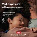 Man en vrouw slapen met Alpine oordopjes in. "Vertrouwd door miljoenen slapers."