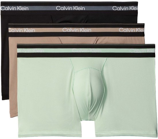Drie Calvin Klein boxershorts in zwart, beige en lichtgroen met logo tailleband.