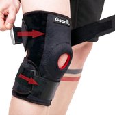 Zwarte kniebrace met rode stiksels en openingen, te verstellen met klittenband.