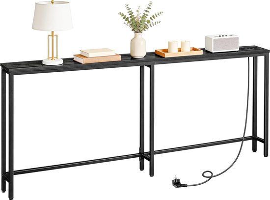 Lange, smalle zwarte consoletafel met lamp, vaas, boeken, dienblad met kaarsen en speaker.