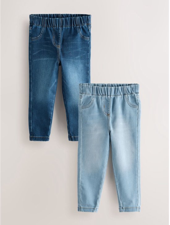 Twee jeggings, één donkerblauw en één lichtblauw, met elastische tailleband.