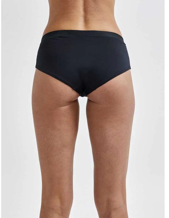 Achterkant van een zwarte Craft sportonderbroek met elastische tailleband.