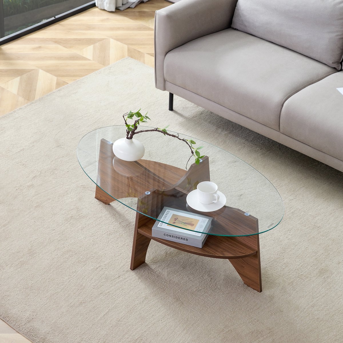 FloraGrace Salontafel - Ovale Glazen Tafel Met Opbergplank - Voor Woonkamer - MDF En Glas - 104,9 x 60 cm - Transparant Notenhout