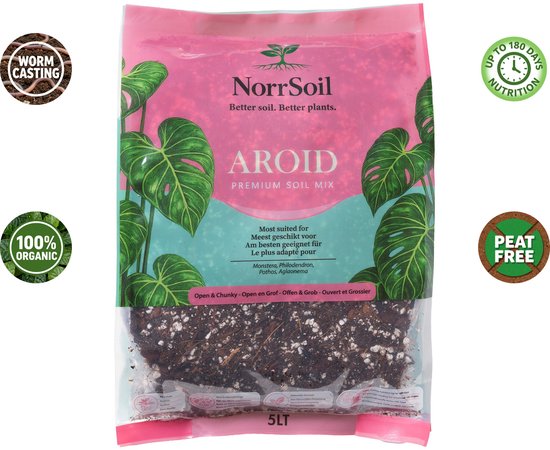 Roze zak met Monstera bladeren. AVOID PREMIUM SOIL MIX, 5L. Met worm casting en 100% organic.