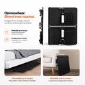 Zwarte opvouwbare laptoptafel, compact voor opbergen onder bed of bank. Met 'Opvouwbaar' en 'makkelijk mee te nemen' in tekst.