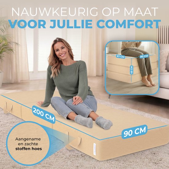 Vrouw zit op een crèmekleurig, 200 cm lang matras. Matras is 90 cm breed. Afmetingen 67x90x45 cm op de bijgevoegde foto. "Aangename en zachte stoffen hoes".