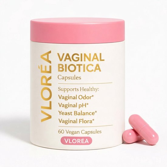 Witte Vloréa Vaginal Biotica pot met roze dop, met twee roze capsules ernaast.