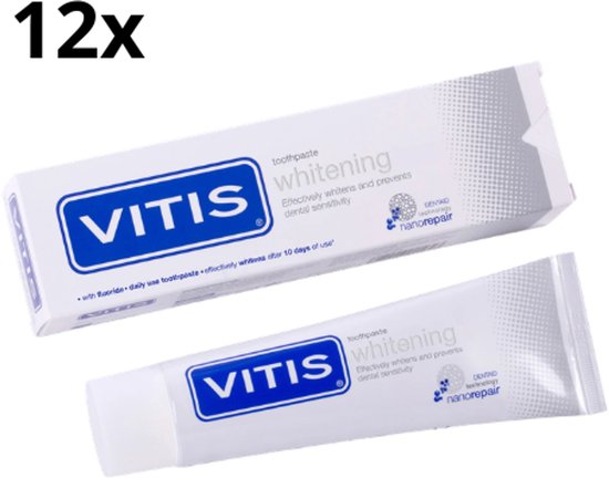Twaalf Vitis whitening tandpasta tubes en verpakkingen.