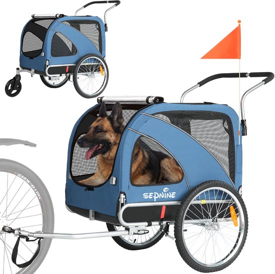 Blauwe fietskar voor honden met Duitse herder, inclusief aanhangerkoppeling en oranje vlag.