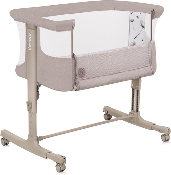Beige co-sleeper met gaaspanelen, een print van paardenbloemen en verstelbare hoogte.