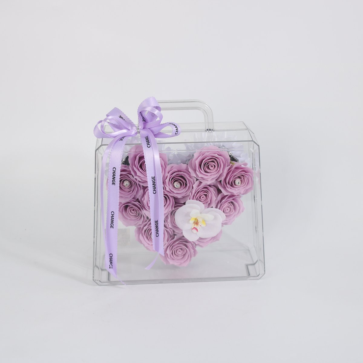 La Roselle Amsterdam Kunst rozen Lavender Heart Case – Luxe Paarse Kunstrozen in Transparante Handtas – Hartvormig Bloemenarrangement met Orchidee Lavendelpaars en wit