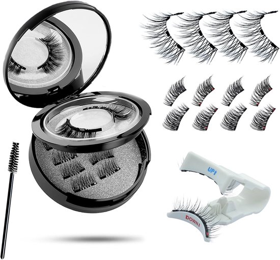 Een open zwarte spiegelhouder met magnetische wimpers, naast losse wimpers en een witte applicator.