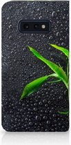 Geschikt voor Samsung Galaxy S10e Standcase Hoesje Design Orchidee