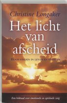 Boek "Het licht van afscheid" met een zonsondergang boven de oceaan op de omslag. Titel en ondertitel in de lucht.