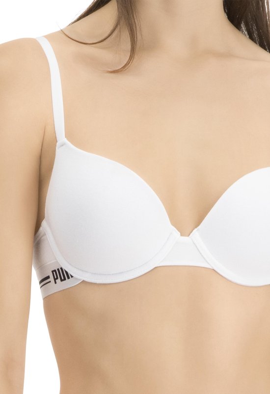 Detail van een witte Puma beugelbeha met geribbelde stof en zwarte 'Puma'-logoband.