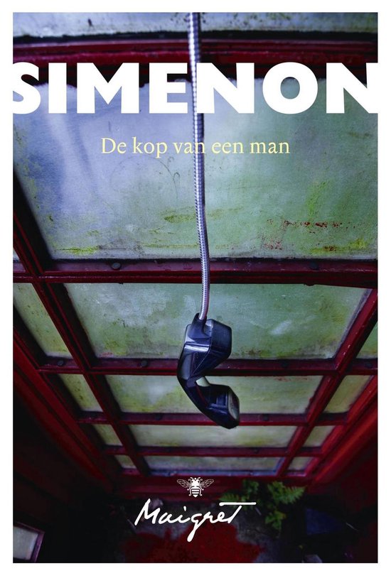 Couverture du livre 'De kop van een man' avec SIMENON en grosses lettres, un combiné téléphonique suspendu et le logo Maigret.