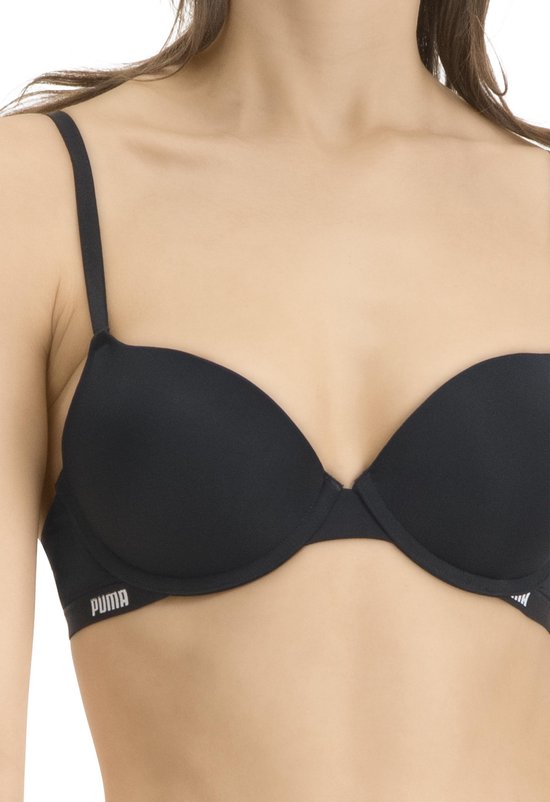 Zwarte push-up bh van Puma met logo band, op een model