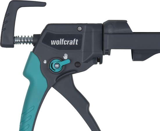 Wolfcraft kitspuit met een antracietgrijze en teal kleurige greep.