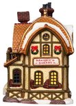 Verlicht Lemax 'Meijer's Bakery' gebouw met kerstkransjes.