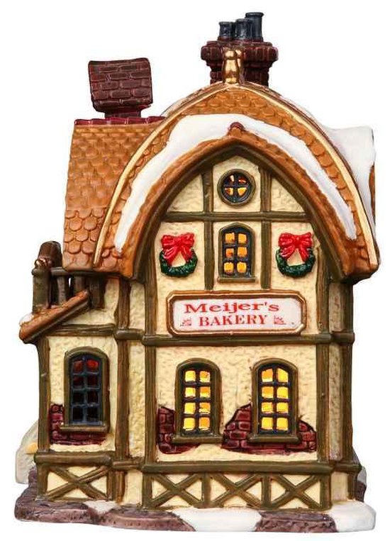 Verlicht Lemax 'Meijer's Bakery' gebouw met kerstkransjes.