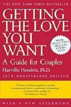 Boek "Getting The Love You Want" in het rood met witte tekst en een gele band.