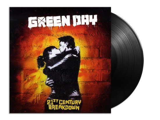 Pochette du 33 tours Green Day 21st Century Breakdown avec un couple s'embrassant devant un mur de briques.