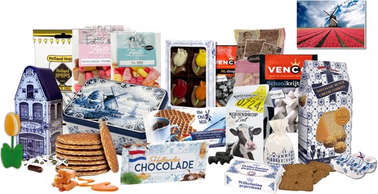 Assortiment Hollandse lekkernijen en souvenirs: Delfts blauw huisje, tulpen, stroopwafels, kaaskoekjes, chocolade, drop, pepermunt en kermissnoepjes.